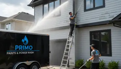 Professional pressure washing home exterior in Evansville, IN for siding and driveway restoration